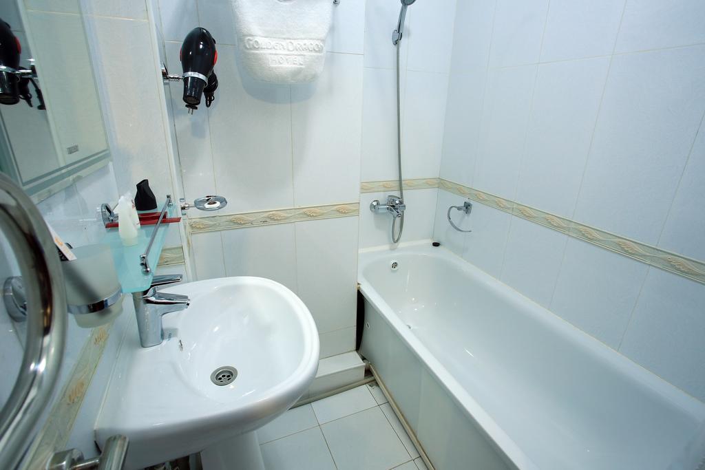 Golden Dragon Aparthotel บิชเคก ห้อง รูปภาพ